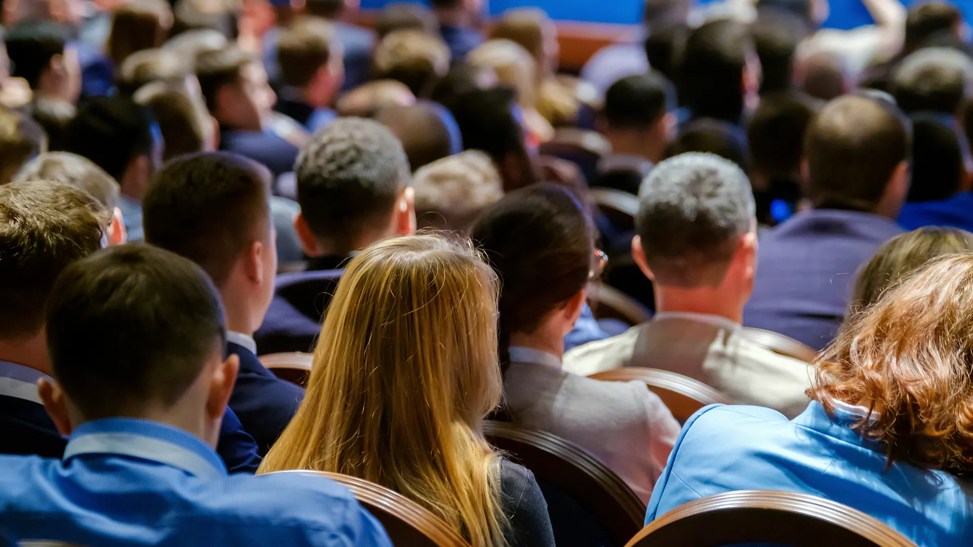 Conference audience in a modern Gulf venue